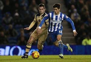 Images Dated 24th February 2015: Brighton & Hove Albion vs Leeds United: Joao Carlos Teixeira's Intense Midfield Battle in Sky Bet