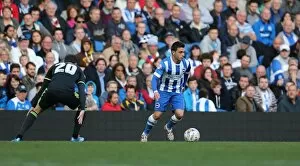 Images Dated 18th October 2014: Brighton & Hove Albion vs Middlesbrough: Intense Moment between Adrian Colunga and Opponent