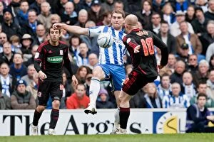 Images Dated 31st March 2012: Brighton & Hove Albion vs Middlesbrough: Sam Vokes Battles for Ball Supremacy
