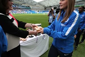 Images Dated 31st July 2016: Brighton and Hove Albion Women Celebrate Trophy Victory Ahead of EFL Sky Bet Championship Clash