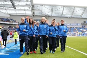 Images Dated 3rd April 2015: Brighton and Hove Albion Women's Team Celebrates Championship Victory with Lap of Honor
