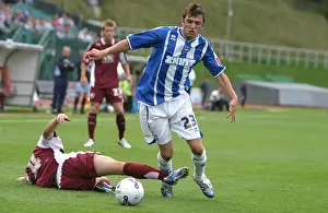 Brighton & Hove Albion's Doug Loft in Action: A Moment of Determination Against Chesterfield