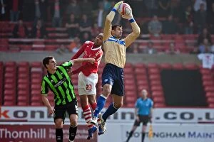 Images Dated 24th March 2012: Brighton & Hove Albion's Peter Brezovan in Championship Showdown Against Nottingham Forest