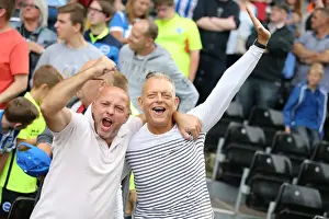 Celebratory Prints: Brighton & Hove Albion's Thrilling Victory at Craven Cottage: Fans Celebrate in Jubilant Mood (Fulham vs)