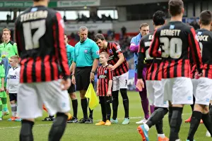 Bolton Wanderers 28FEB15 Prints: Brighton Mascot's Exciting Encounter at Bolton Wanderers Championship Match