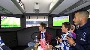 Images Dated 17th December 2016: Brighton's Liam Rosenior Joins Fans for a Game of FIFA Aboard the Sky Bet 10 in 10 Bus to