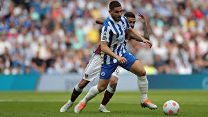 West Ham United 22MAY22 Collection: Brighton's Maupay Fights for Possession Against West Ham in Intense Premier League Clash (22MAY22)