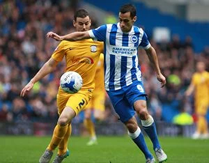 Images Dated 24th October 2015: Brighton's Sam Baldock Shields Ball from Vermijl in Championship Clash
