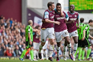 Celebrating Glory: Nolan, Vaz Te, and Cole in West Ham's Victory over Brighton & Hove Albion (April 14, 2012)