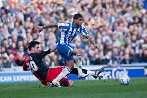Images Dated 10th March 2012: Championship Showdown: Liam Bridcutt's Battle Against Portsmouth at Amex Stadium (March 10, 2012)