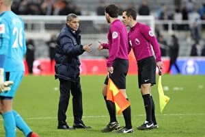 Images Dated 30th December 2017: Chris Hughton of Brighton and Hove Albion Shakes Hands with Referees after Newcastle United Match