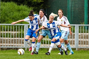 Women's Match Prints: Clash in Women's Football: West Ham United vs. Brighton & Hove Albion (Season 2013-14)