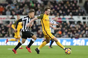 Newcastle United 30DEC17 Prints: Dale Stephens Shields Ball from Dwight Gayle: Intense Midfield Battle at St