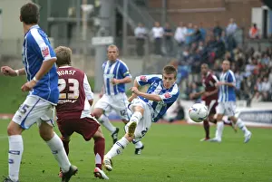 Dean Cox of Brighton & Hove Albion FC in Action: A Shooting Moment