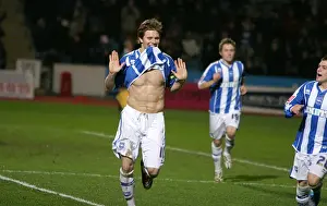 Dean Hammond celebrates his second goal against Cheltenham Town
