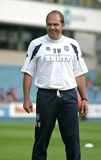 Dean Wilkins Leading Warm-Up at The New Den, Millwall: Brighton and Hove Albion FC