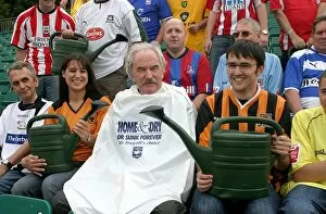 Images Dated 10th November 2006: Des Lynam gets a soaking