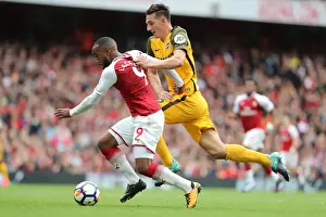 Arsenal 01OCT17 Prints: Dunk vs. Lacazette: Intense Battle at the Emirates - Arsenal vs