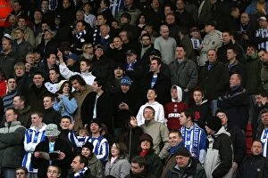 Images Dated 2nd January 2007: Electric Atmosphere: Brighton & Hove Albion Fans Celebrate New Year's Day Victory at Bournemouth