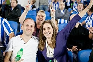 Images Dated 21st August 2012: Electric Atmosphere: Brighton & Hove Albion Fans in Action at The Amex Stadium (2012-13)