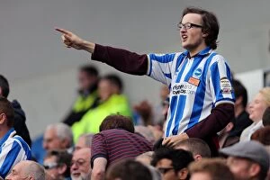 Images Dated 20th October 2012: The Electric Atmosphere of Brighton & Hove Albion Fans at Amex Stadium (2012-2013)