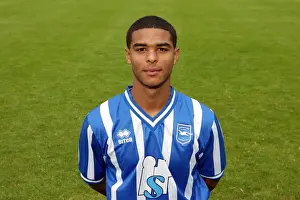 Liam Bridcutt Prints: Focused Midfielder Liam Bridcutt of Brighton & Hove Albion: Gearing Up for Action
