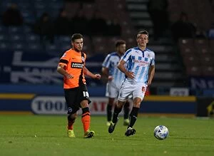 Images Dated 21st October 2014: Forster-Caskey in Action: Huddersfield vs. Brighton, Championship Clash (21 October 2014)