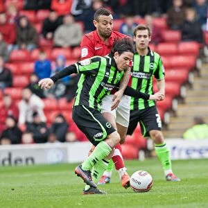 Images Dated 28th April 2012: Gai Assulin vs. Craig Davies: Intense Moment in the Npower Championship Clash between Barnsley