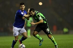 Images Dated 23rd October 2012: Gary Dicker in Intense Possession Battle: Brighton & Hove Albion vs