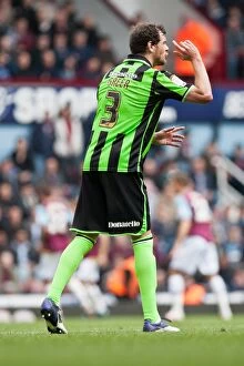 Images Dated 14th April 2012: Gordon Greer of Brighton & Hove Albion Facing Off Against West Ham United