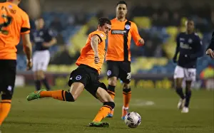 Millwall Prints: Gordon Greer Leads Brighton and Hove Albion in Championship Clash against Millwall (17MAR15)