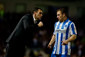 Event:bc 20120307 Prints: Gus Poyet Engages with Alan Navarro During Brighton & Hove Albion vs Cardiff City