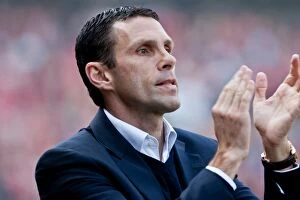 Images Dated 24th March 2012: Gus Poyet Leads Brighton & Hove Albion at The City Ground, Nottingham Forest Championship Clash