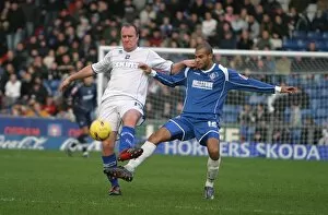 Images Dated 18th December 2006: Guy Butters beats Oldhams Chris Hall to the ball