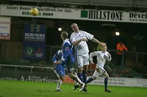 Images Dated 18th December 2006: Guy Butters beats Oldhams Paul Warne in the air