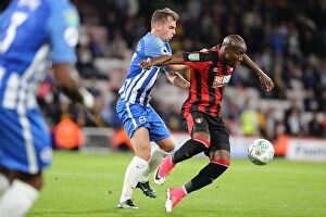 Images Dated 19th September 2017: Hutchinson vs. Afobe: Clash of the Stars in Bournemouth vs. Brighton EFL Cup Match (19SEP17)