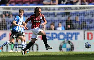 Wigan Athletic 18APR15 Prints: Inigo Calderon: Defending for Brighton and Hove Albion against Wigan Athletic