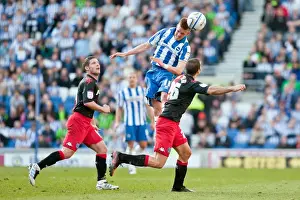 Intense Action: Craig Noone vs Portsmouth in the Championship Clash at Amex Stadium (March 10, 2012)