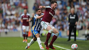 Images Dated 22nd May 2022: Intense Rivalry: Neal Maupay vs. Declan Rice - Battle for Possession (Brighton & Hove Albion vs)