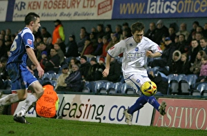 Images Dated 18th December 2006: Jake Robinson takes on Oldhams Neil Eardley