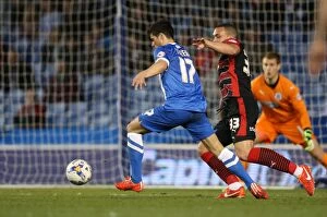 Images Dated 14th April 2015: Joao Carlos Teixeira in Action: Brighton Midfielder Fights for Possession against Huddersfield