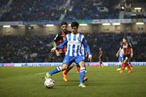Joao Carlos Teixeira in Action: Brighton Midfielder Fights for Possession against AFC Bournemouth (April 10, 2015)