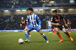 Joao Carlos Teixeira in Action: Brighton Midfielder Fights for Possession against AFC Bournemouth (April 10, 2015)