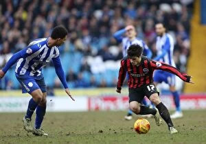Images Dated 14th February 2015: Joao Carlos Teixeira in Action: Championship Showdown between Sheffield Wednesday