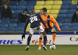 Images Dated 17th March 2015: Joe Bennett in Action: Championship Showdown at The Den - Millwall vs