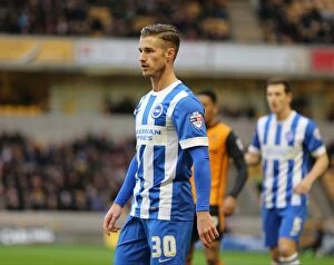 Images Dated 20th December 2014: Joe Bennett Faces Off in Championship Clash: Brighton and Hove Albion vs