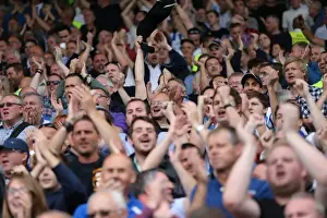Celebratory Prints: Jubilant Albion Fans Celebrate Championship Victory at Craven Cottage, 2015