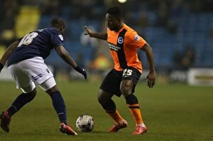Images Dated 17th March 2015: Kazenga LuaLua in Action: Brighton Midfielder Battles in Championship Clash against Millwall