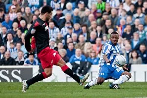 Images Dated 10th March 2012: Kazenga LuaLua's Electrifying Performance: Brighton & Hove Albion vs Portsmouth