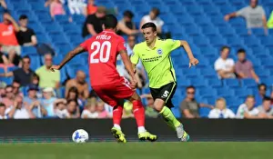 Prints of Lewis Dunk during the pre-season friendly match between Brighton and Hove Albion and Sevilla FC at the American Express Community Stadium, Falmer, England on 2nd August 2015 Pre-Season Prints: Lewis Dunk in Action: Brighton & Hove Albion vs Sevilla FC, 2015 Pre-Season Friendly